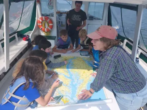 Students are out on a sailing adventure.