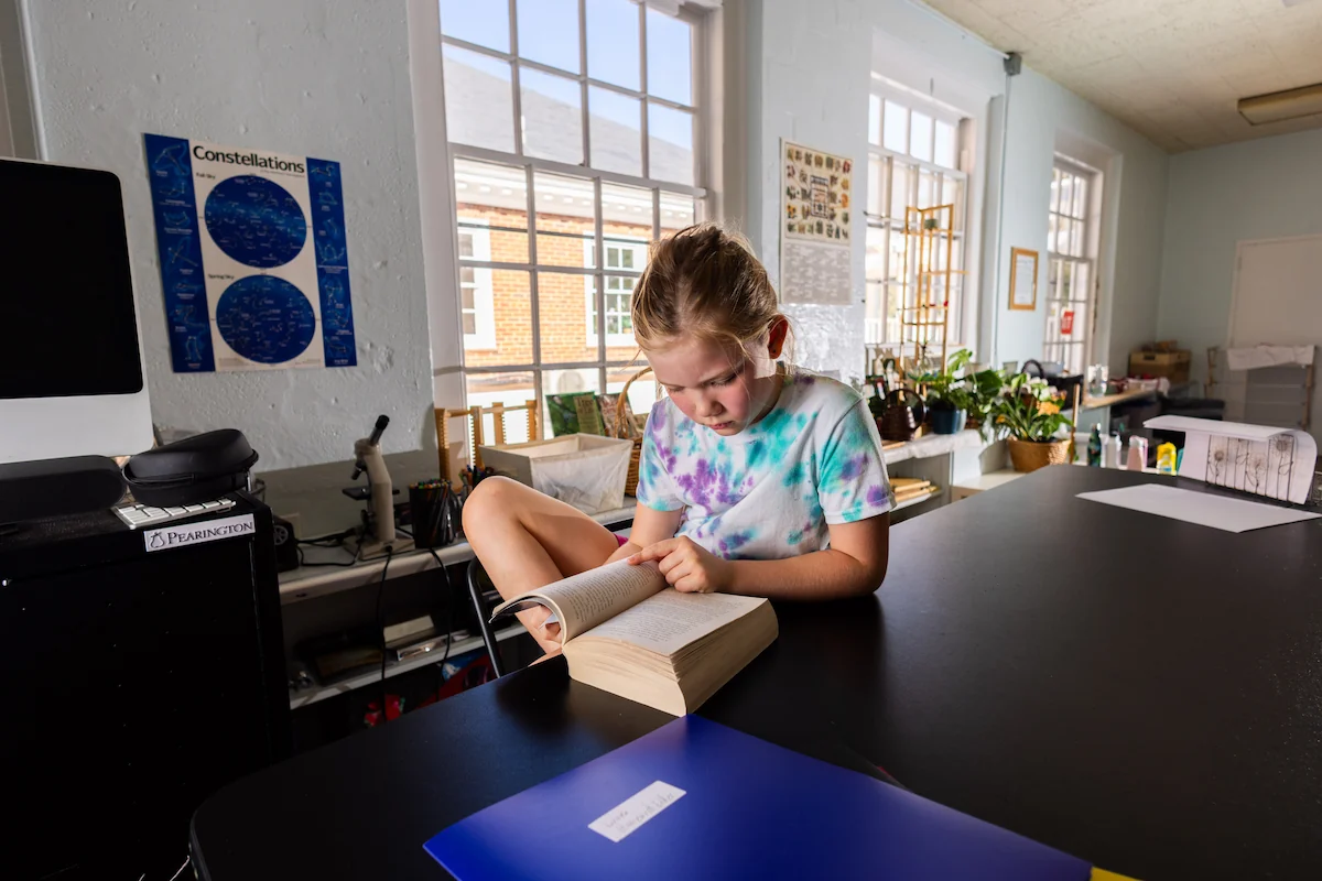 A girl is immersed in a book