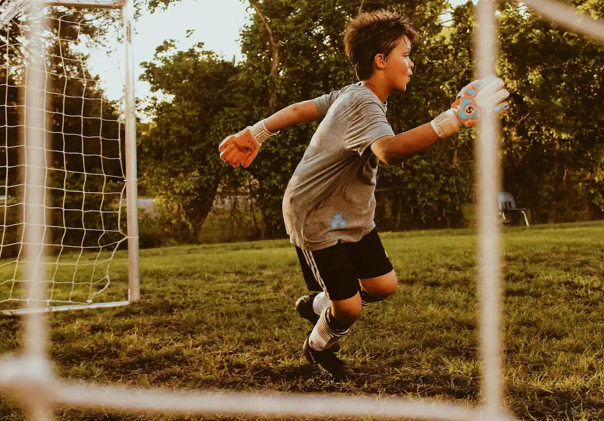 Photo of a student playing soccer