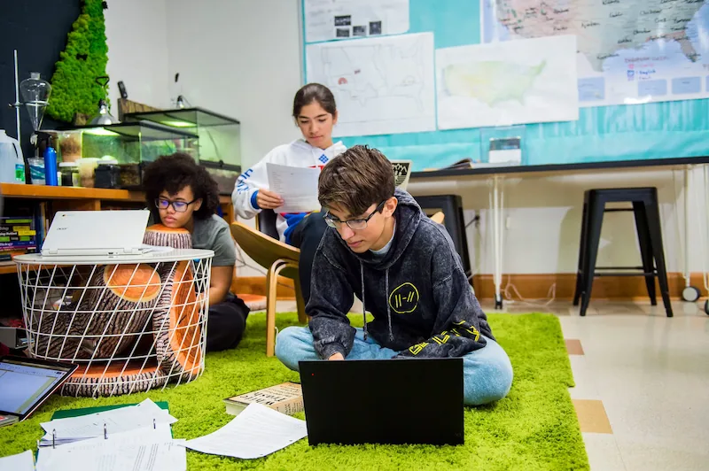 A group of students are sat working on their projects.