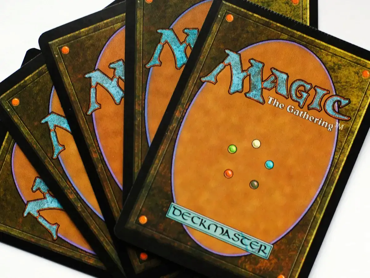 A photo showing the backs of magic the gathering cards.