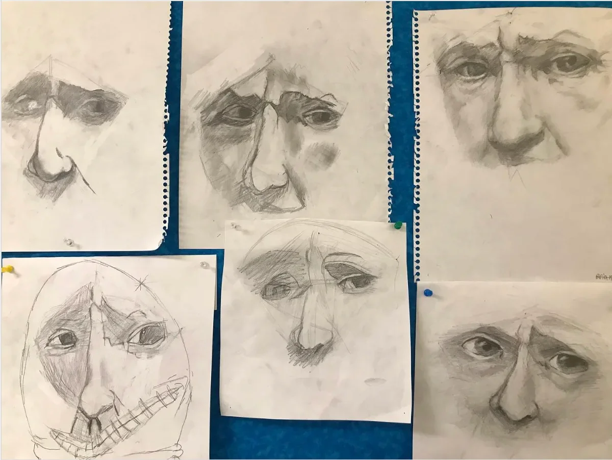 This photo depicts six different pencil sketches of faces incorporating linework and shading.