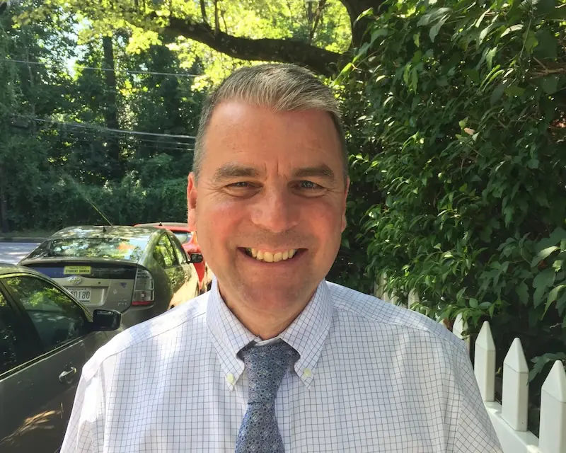 Portrait photo of school founder Andrew Kutt