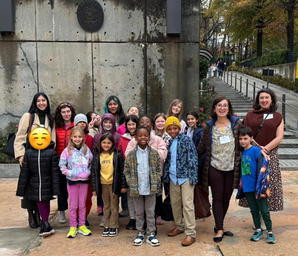 Group of Italian students and teachers standing in front of Italian Embassies (Grades 1-5)
